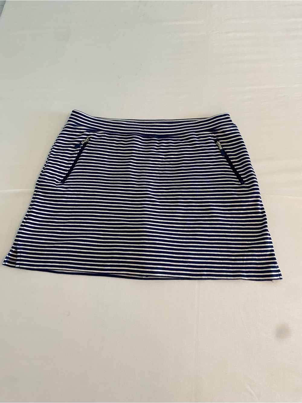 Striped Navy and White Mini Skirt With shorts underneath.